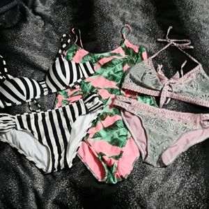 3 swimsuits.